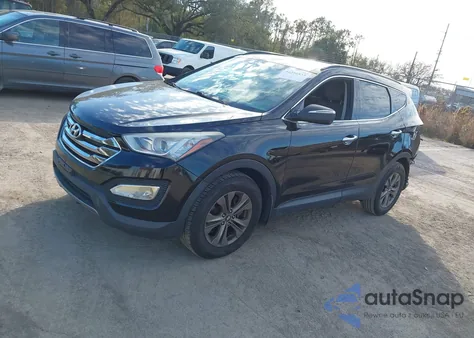 2014 Hyundai Santa Fe Sport 2.4L z USA, uszkodzony, nr VIN 5XYZUDLB7EG209088